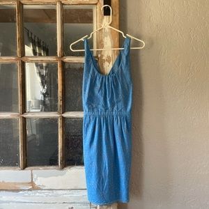 Cute summer dress with low back.